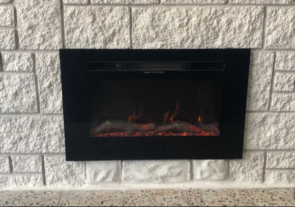 Alchemy Fireplaces 26” Wall Mounted Electric Fireplace – Black Glass, Remote Control, 3 Flame Colours, Logs & Crystals