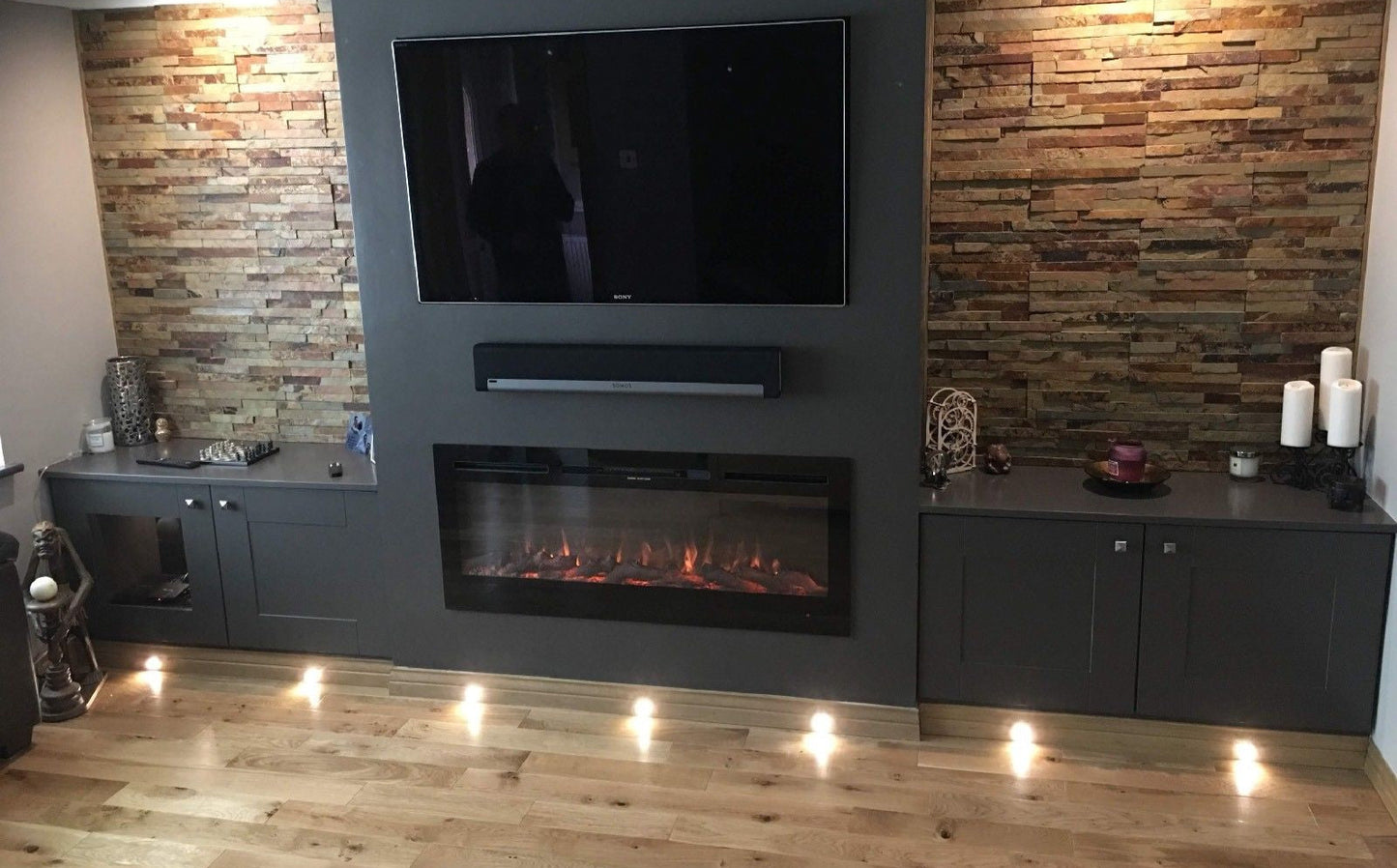 Alchemy Fireplaces 50” Wall Mounted Electric Fireplace with Black Glass, Dual Heat Settings & LED Flame Effects